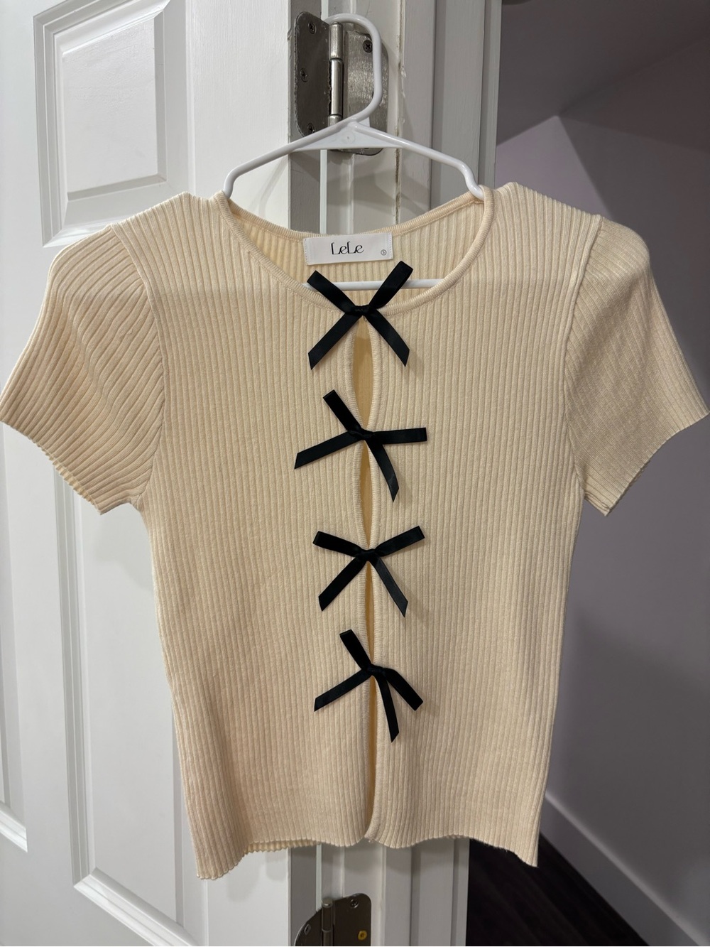 Lele Cream Ribbed Crop Top with Black Bow Trim